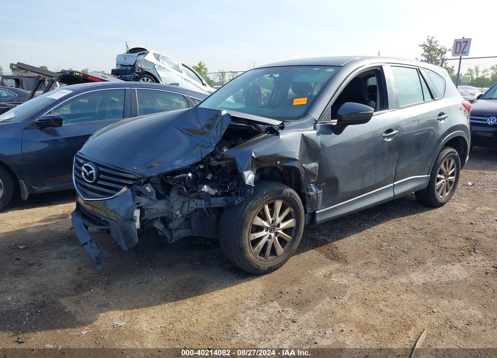 2016 MAZDA CX-5 SPORT VIN: JM3KE4BY2G0742034