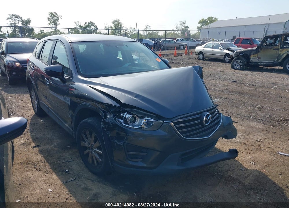 2016 MAZDA CX-5 SPORT VIN: JM3KE4BY2G0742034