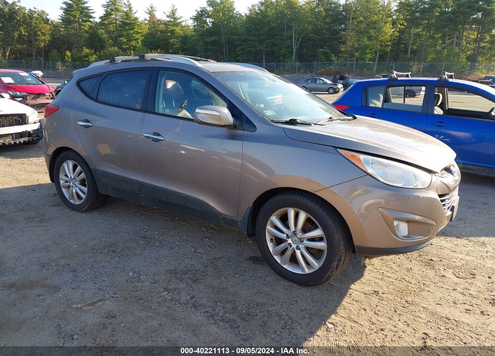 2012 HYUNDAI TUCSON LIMITED VIN: KM8JUCAC5CU424978