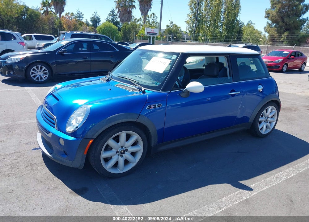 2005 MINI COOPER S VIN: WMWRE33425TD92560