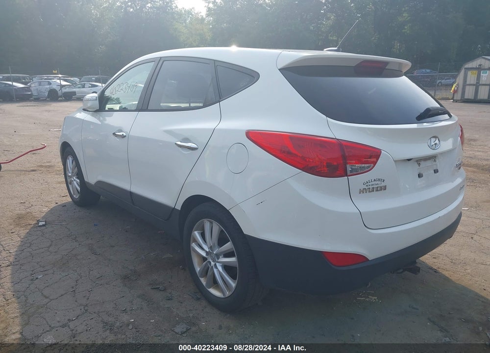 2011 HYUNDAI TUCSON LIMITED VIN: KM8JUCACXBU255751