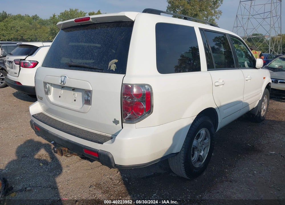 2007 HONDA PILOT EX-L VIN: 5FNYF28567B043265
