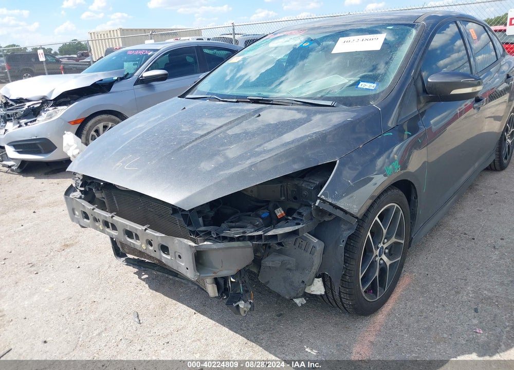 2016 FORD FOCUS SE VIN: 1FADP3F29GL275209