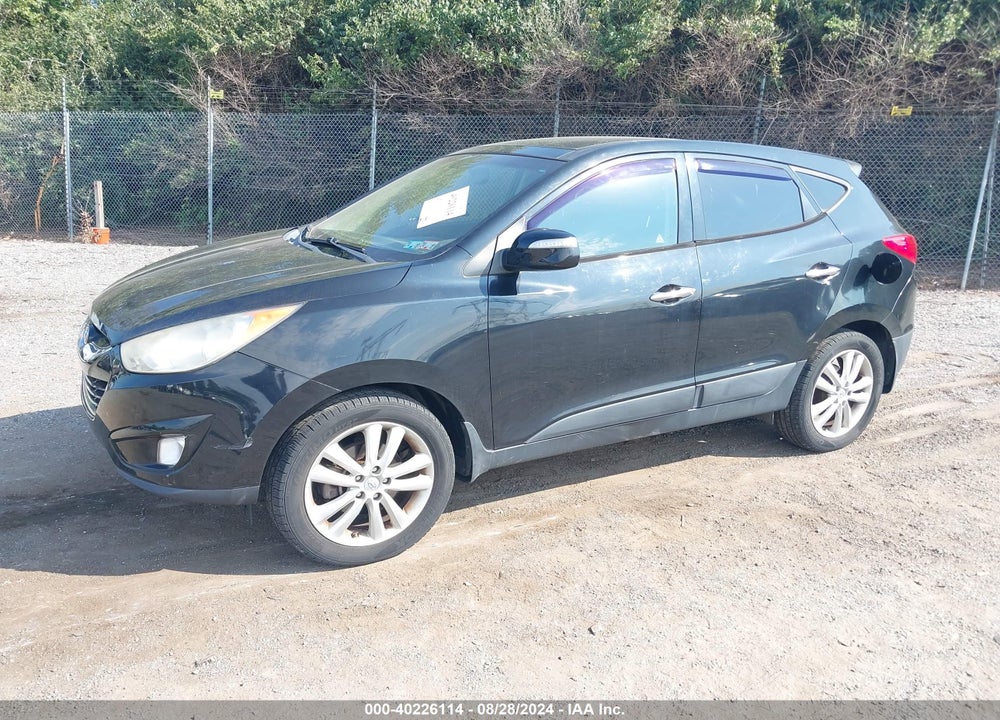 2012 HYUNDAI TUCSON LIMITED VIN: KM8JUCAC1CU537715