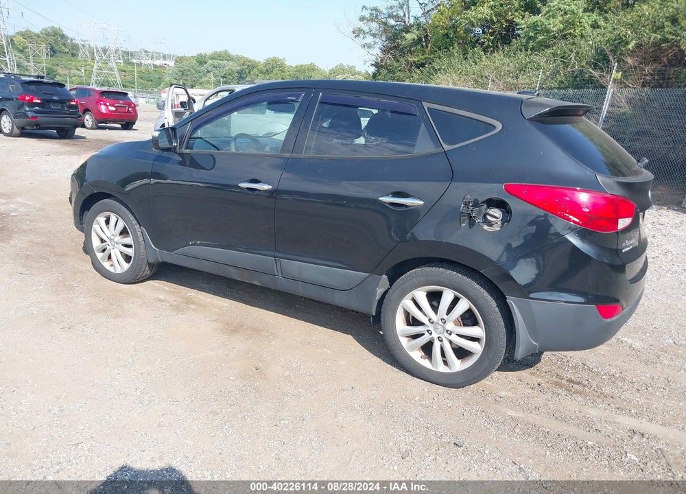 2012 HYUNDAI TUCSON LIMITED VIN: KM8JUCAC1CU537715