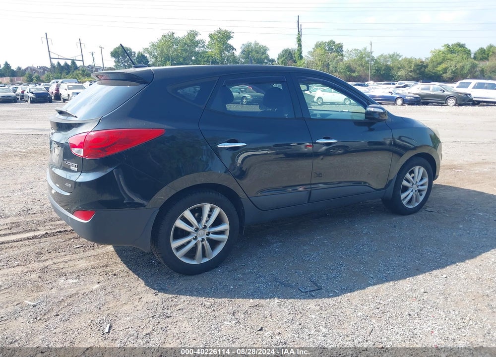 2012 HYUNDAI TUCSON LIMITED VIN: KM8JUCAC1CU537715