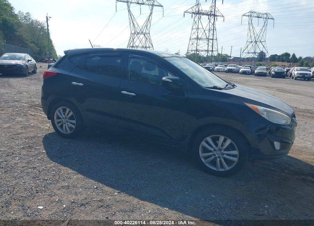 2012 HYUNDAI TUCSON LIMITED VIN: KM8JUCAC1CU537715