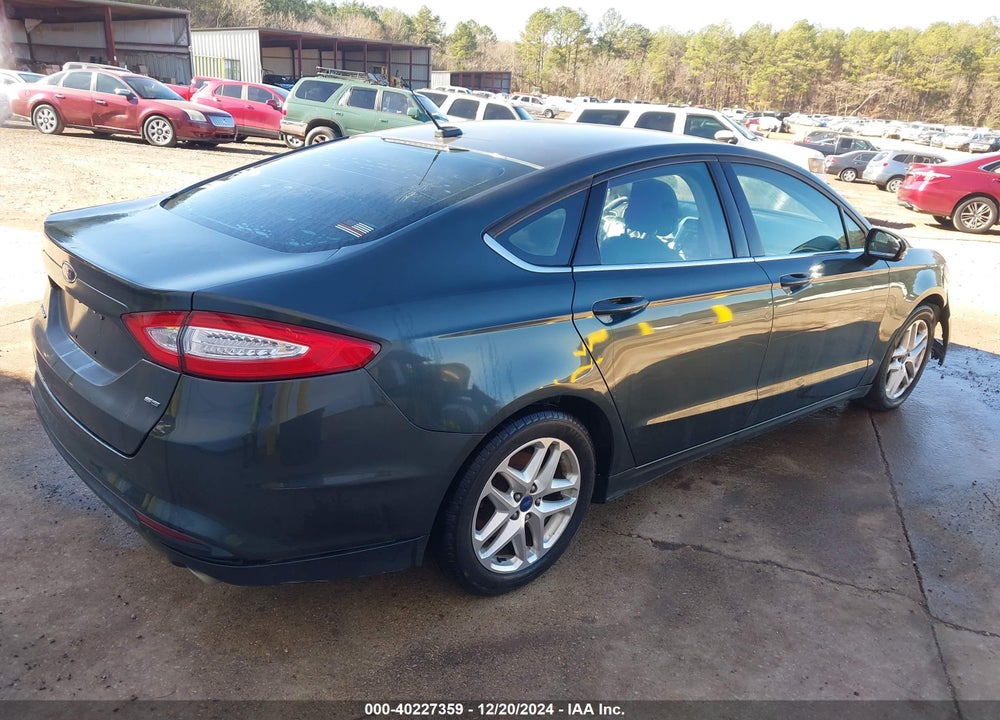 2015 FORD FUSION VIN: 1FA6P0H74F5110090