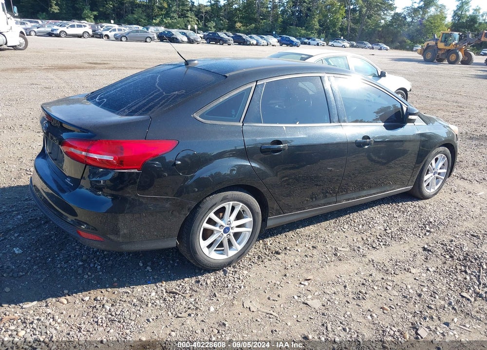 2015 FORD FOCUS SE VIN: 1FADP3F29FL242838