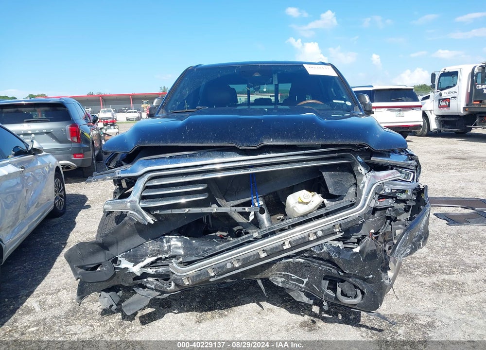 2022 RAM 1500 LIMITED LONGHORN 4X4 5'7 BOX VIN: 1C6SRFKT1NN323614
