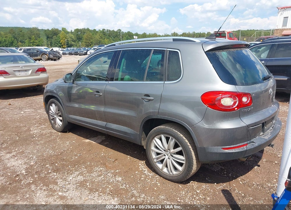 2011 VOLKSWAGEN TIGUAN SE VIN: WVGAV7AX9BW557690