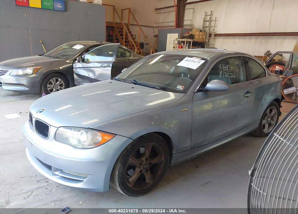 2009 BMW 128I VIN: WBAUP73559VK74594