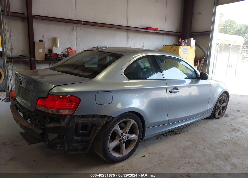 2009 BMW 128I VIN: WBAUP73559VK74594