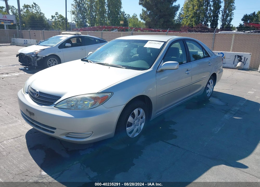 2002 TOYOTA CAMRY LE VIN: JTDBE32K320079564