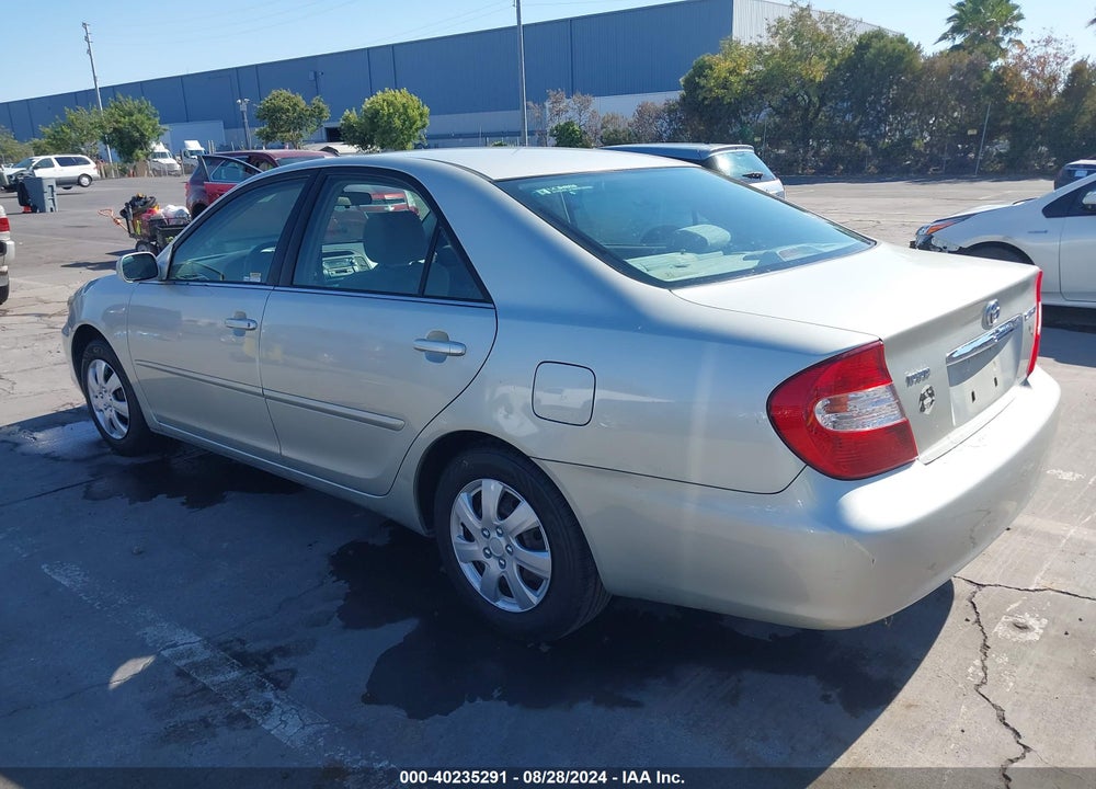 2002 TOYOTA CAMRY LE VIN: JTDBE32K320079564