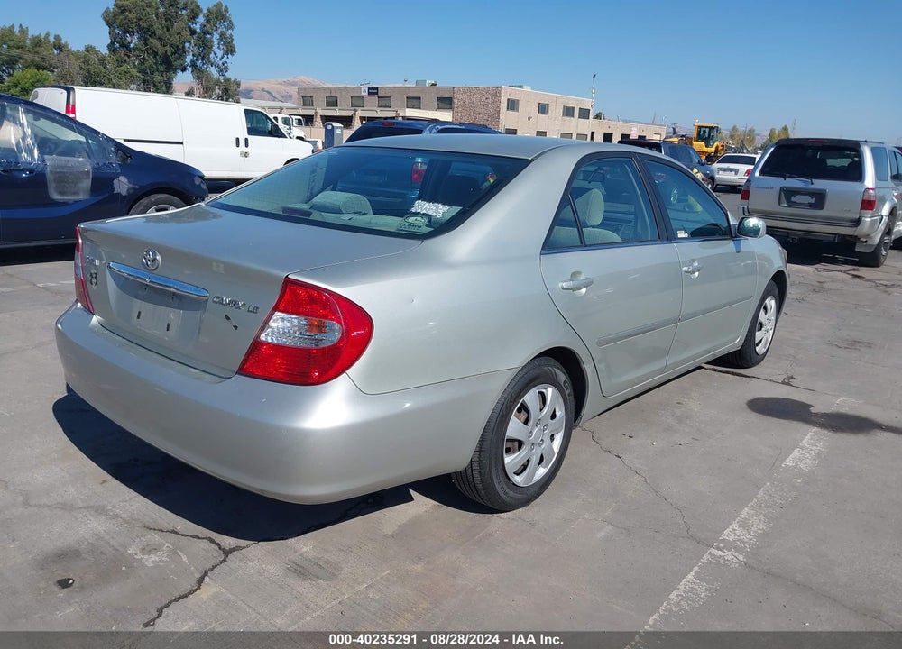 2002 TOYOTA CAMRY LE VIN: JTDBE32K320079564