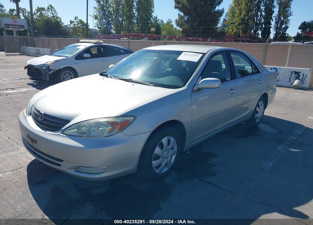 2002 TOYOTA CAMRY LE VIN: JTDBE32K320079564