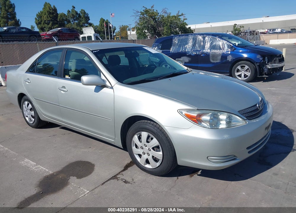 2002 TOYOTA CAMRY LE VIN: JTDBE32K320079564