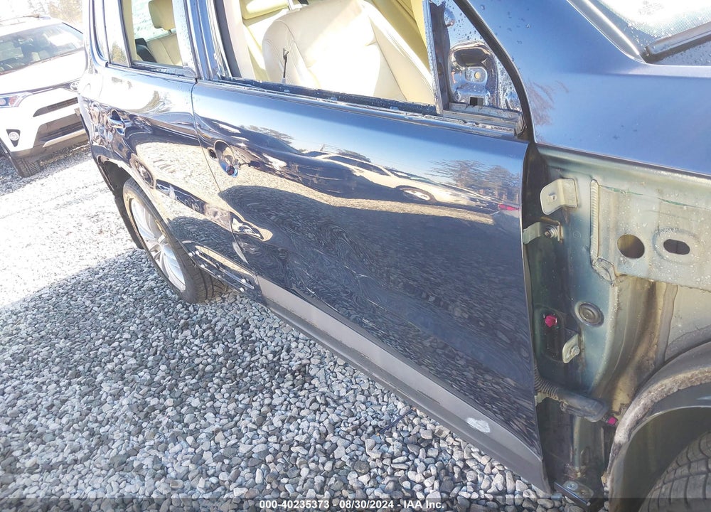2011 VOLKSWAGEN TIGUAN SEL VIN: WVGBV7AX9BW540246