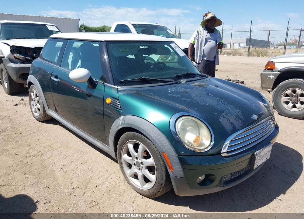 2009 MINI COOPER VIN: WMWMF33529TW75446
