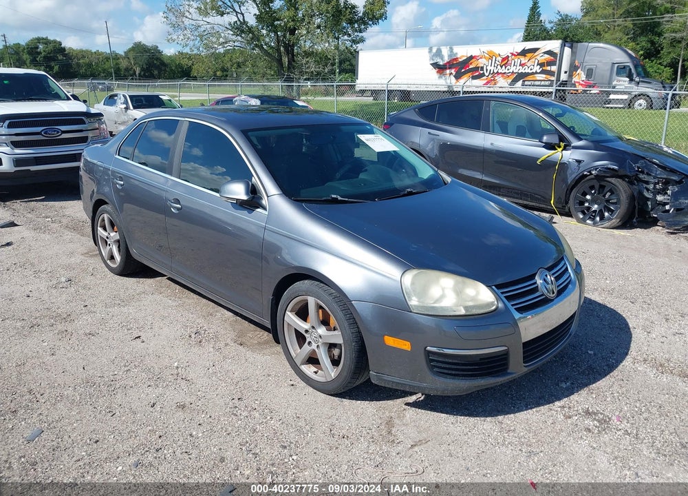 2009 VOLKSWAGEN JETTA VIN: 3VWRM71K89M158419