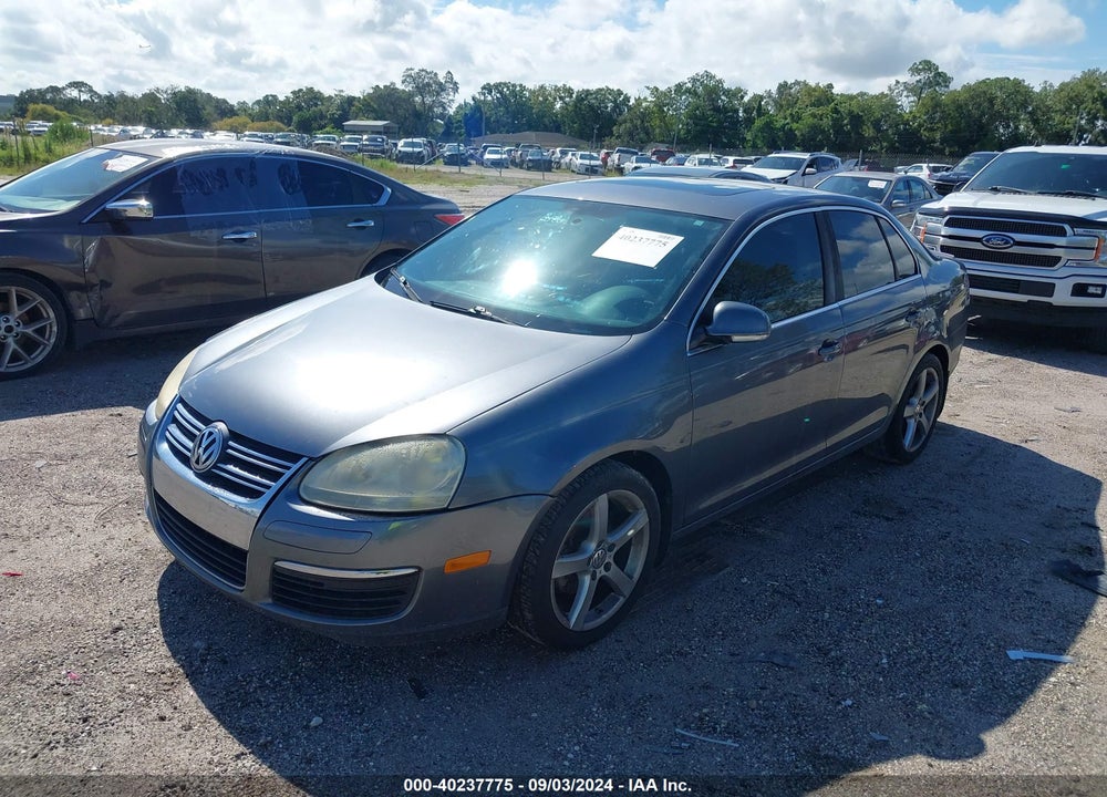 2009 VOLKSWAGEN JETTA VIN: 3VWRM71K89M158419