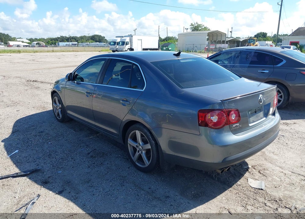 2009 VOLKSWAGEN JETTA VIN: 3VWRM71K89M158419