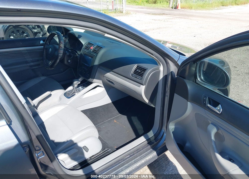 2009 VOLKSWAGEN JETTA VIN: 3VWRM71K89M158419