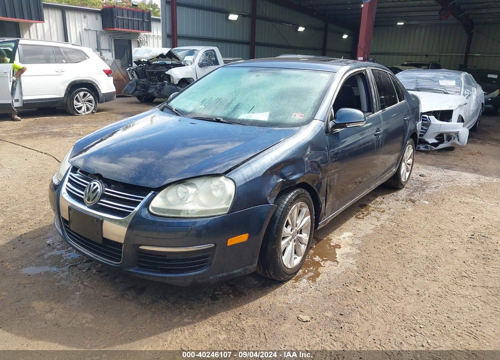 2009 VOLKSWAGEN JETTA VIN: 3VWHZ71KX9M005344