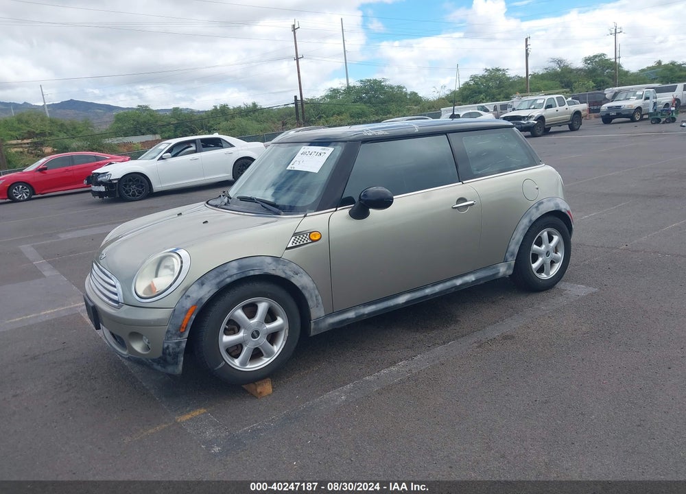 2010 MINI COOPER VIN: WMWMF3C56ATZ65998