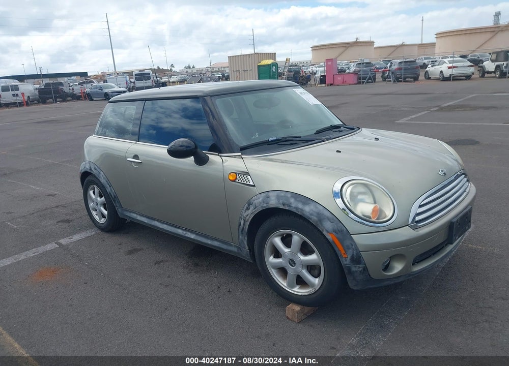 2010 MINI COOPER VIN: WMWMF3C56ATZ65998