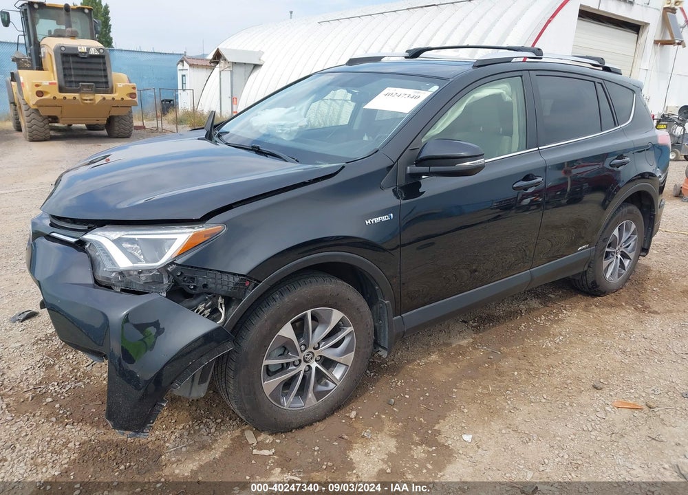 2016 TOYOTA RAV4 HYBRID XLE VIN: JTMRJREV6GD029759