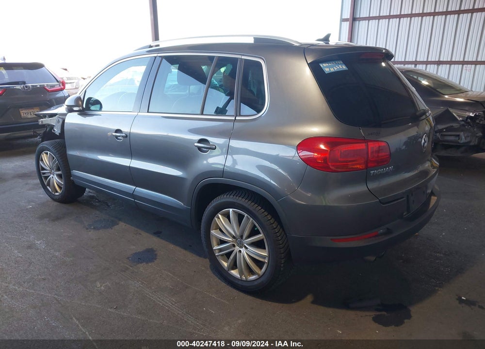 2015 VOLKSWAGEN TIGUAN SEL VIN: WVGBV7AX4FW506401