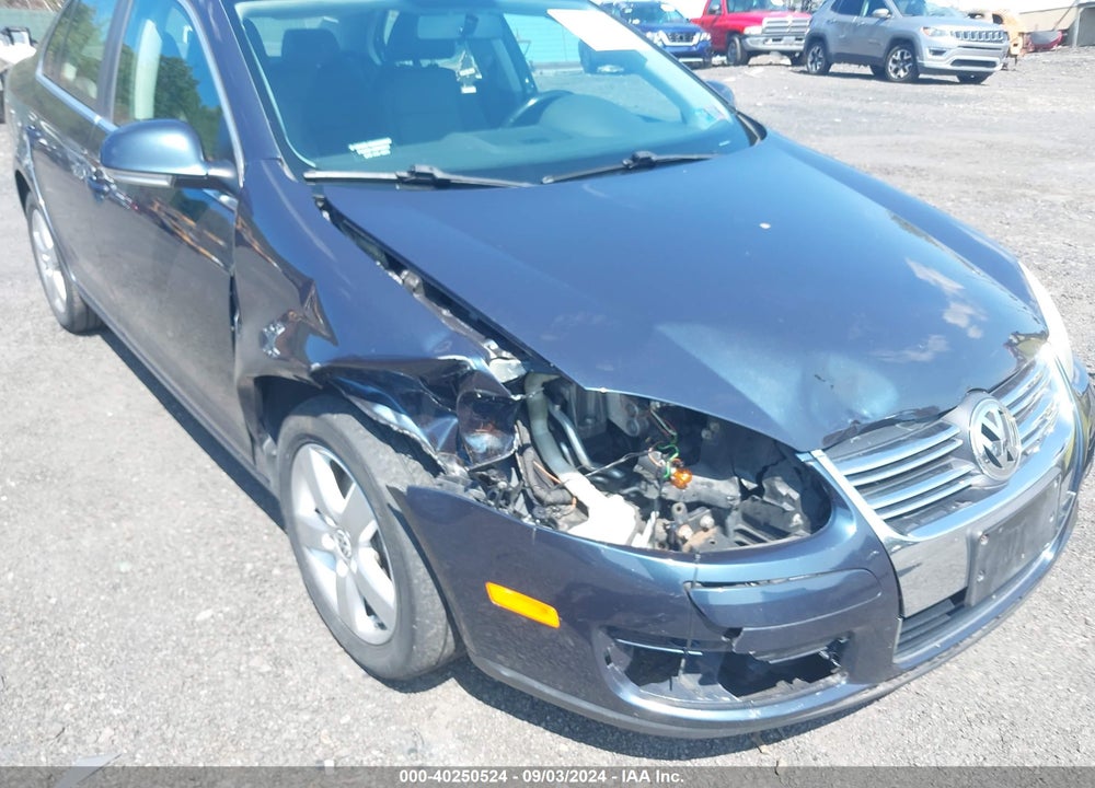 2009 VOLKSWAGEN JETTA SE/SEL VIN: 3VWRM71K99M023403