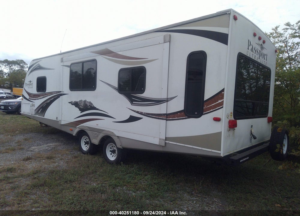 2011 KEYS PASSPO VIN: 4YDT28527BT413788