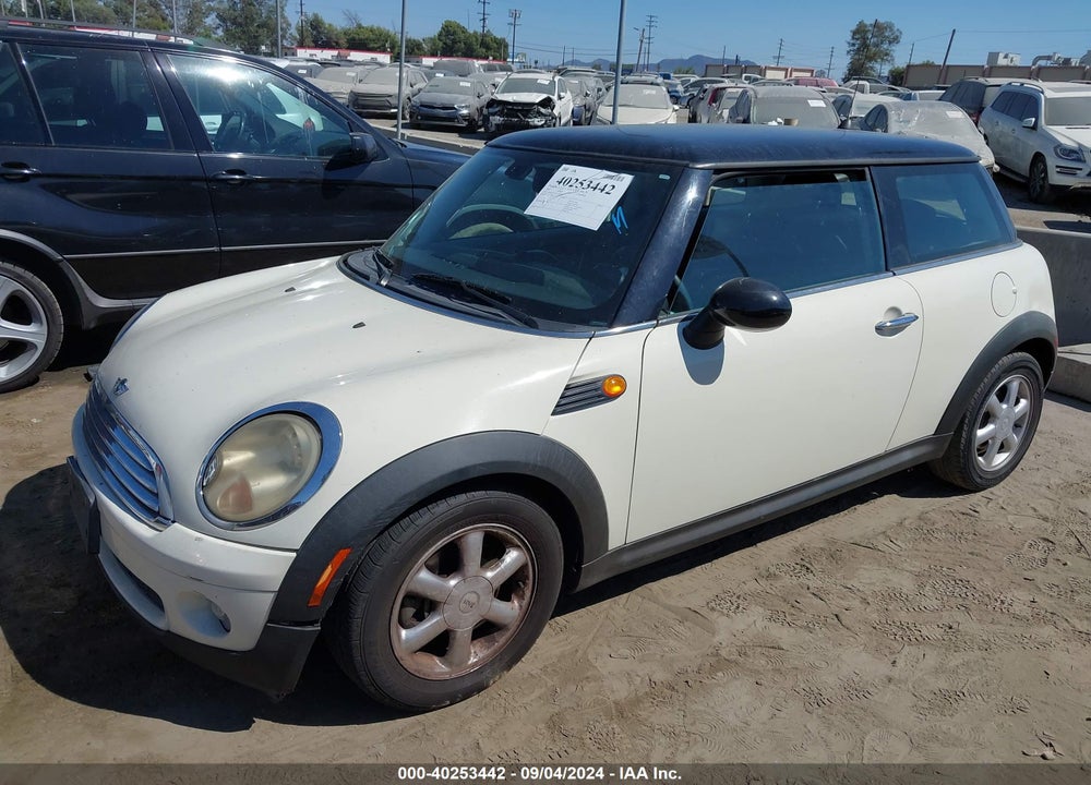 2007 MINI COOPER VIN: WMWMF33517TT54060