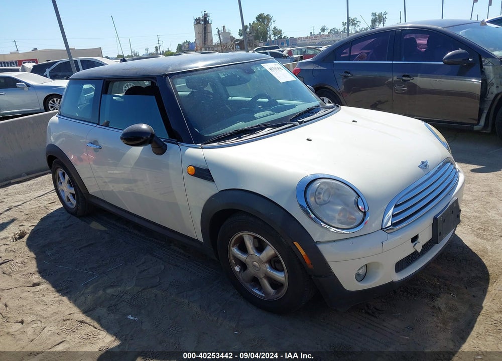 2007 MINI COOPER VIN: WMWMF33517TT54060