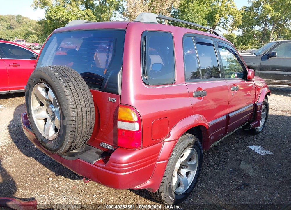 1999 SUZUKI GRAND VITARA JLX/JLX+ VIN: JS3TD62V5X4124573