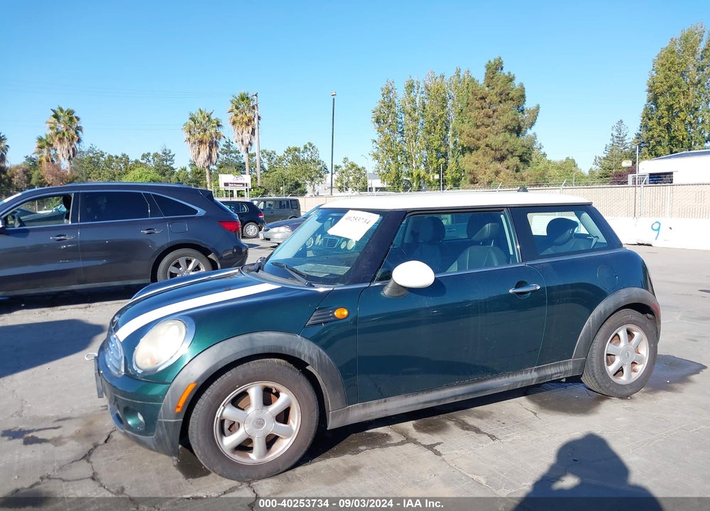 2009 MINI COOPER VIN: WMWMF335X9TU73115