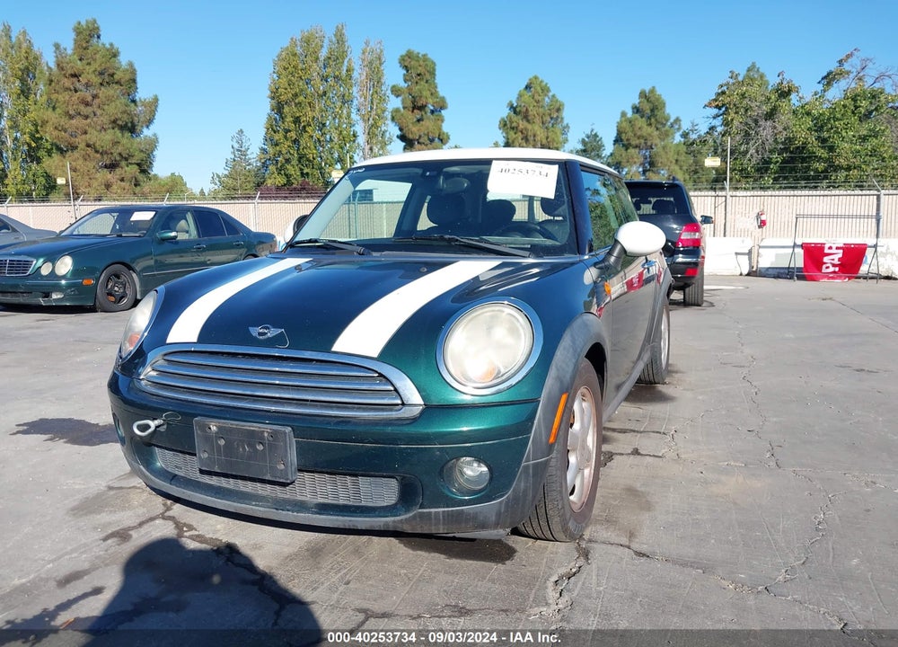 2009 MINI COOPER VIN: WMWMF335X9TU73115