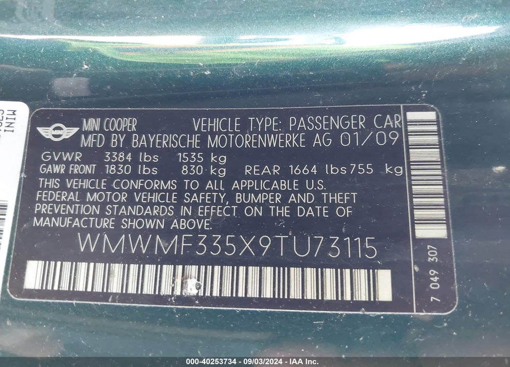 2009 MINI COOPER VIN: WMWMF335X9TU73115