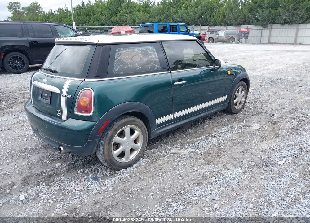 2007 MINI COOPER VIN: WMWMF33507TU60063
