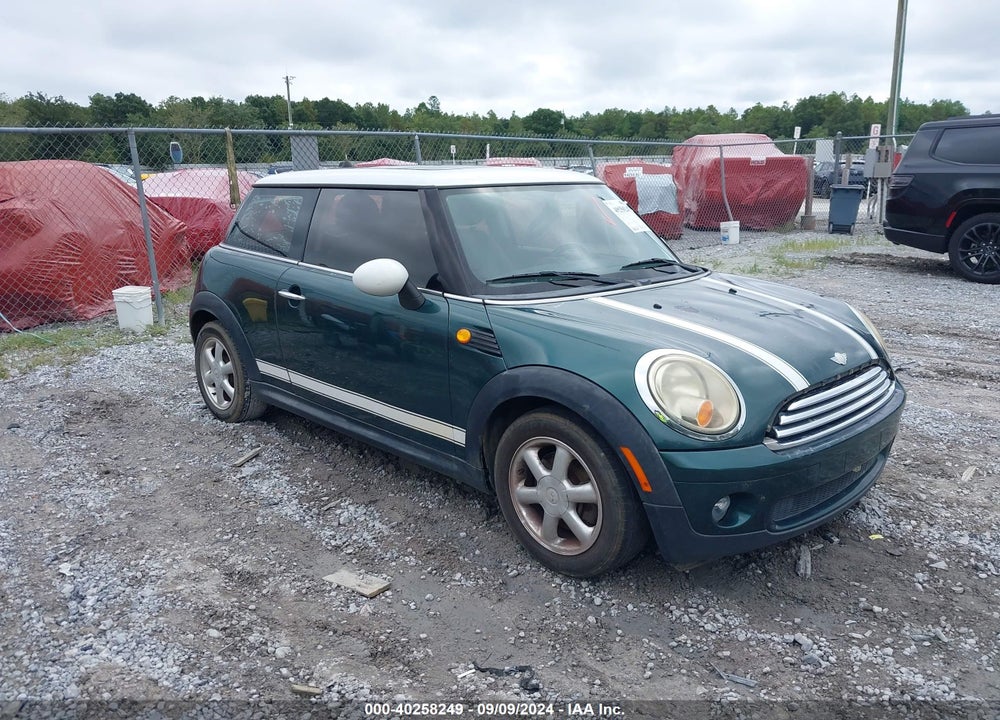 2007 MINI COOPER VIN: WMWMF33507TU60063