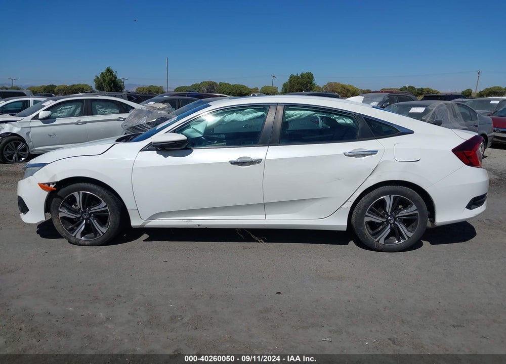 2016 HONDA CIVIC TOURING VIN: 19XFC1F99GE221501