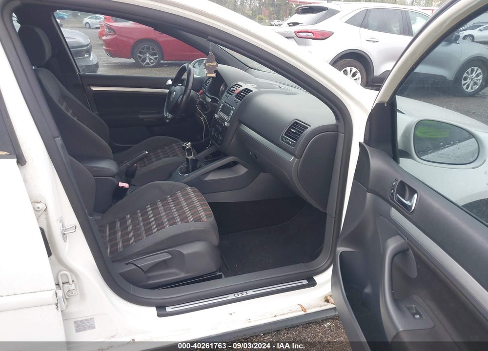 2009 VOLKSWAGEN GTI 4-DOOR VIN: WVWGV71K79W130957