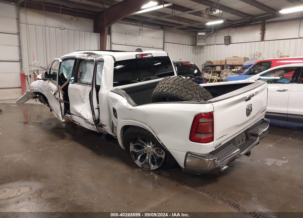 2019 RAM 1500 LIMITED 4X4 5'7 BOX VIN: 1C6SRFHT2KN709574