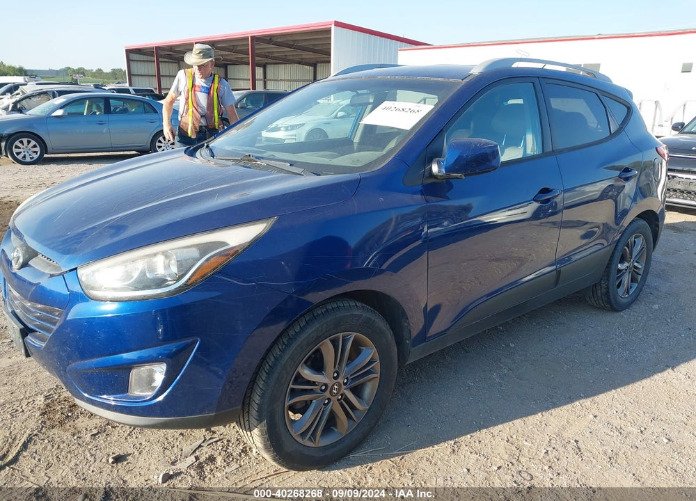 2014 HYUNDAI TUCSON SE VIN: KM8JUCAG9EU915463