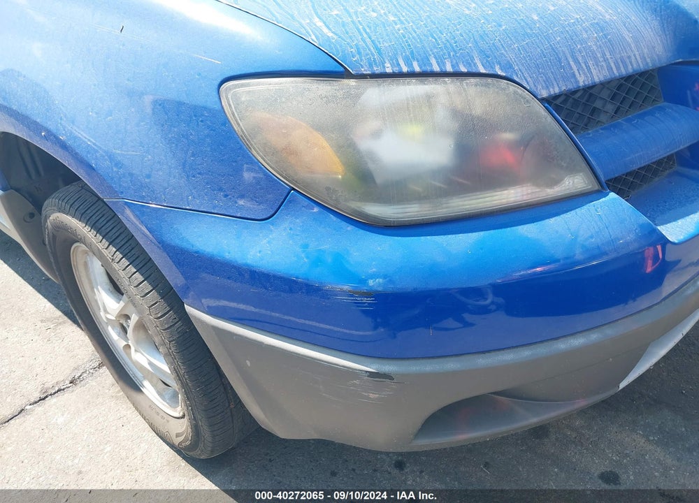 2003 MITSUBISHI OUTLANDER LS VIN: JA4LX31G63U055811