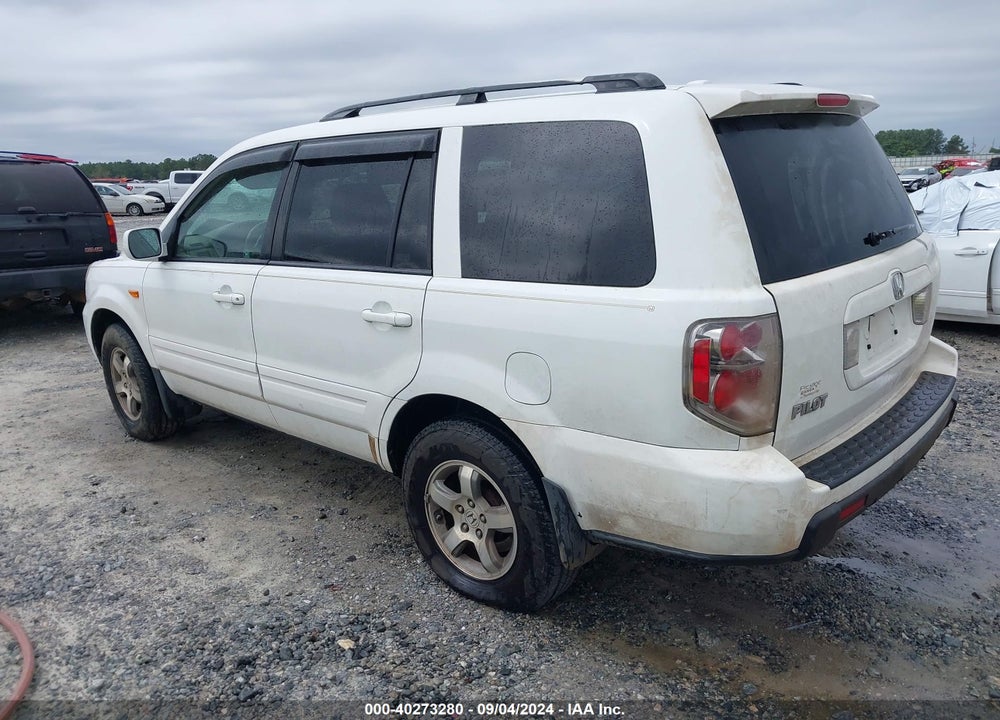 2007 HONDA PILOT EX-L VIN: 5FNYF285X7B040742