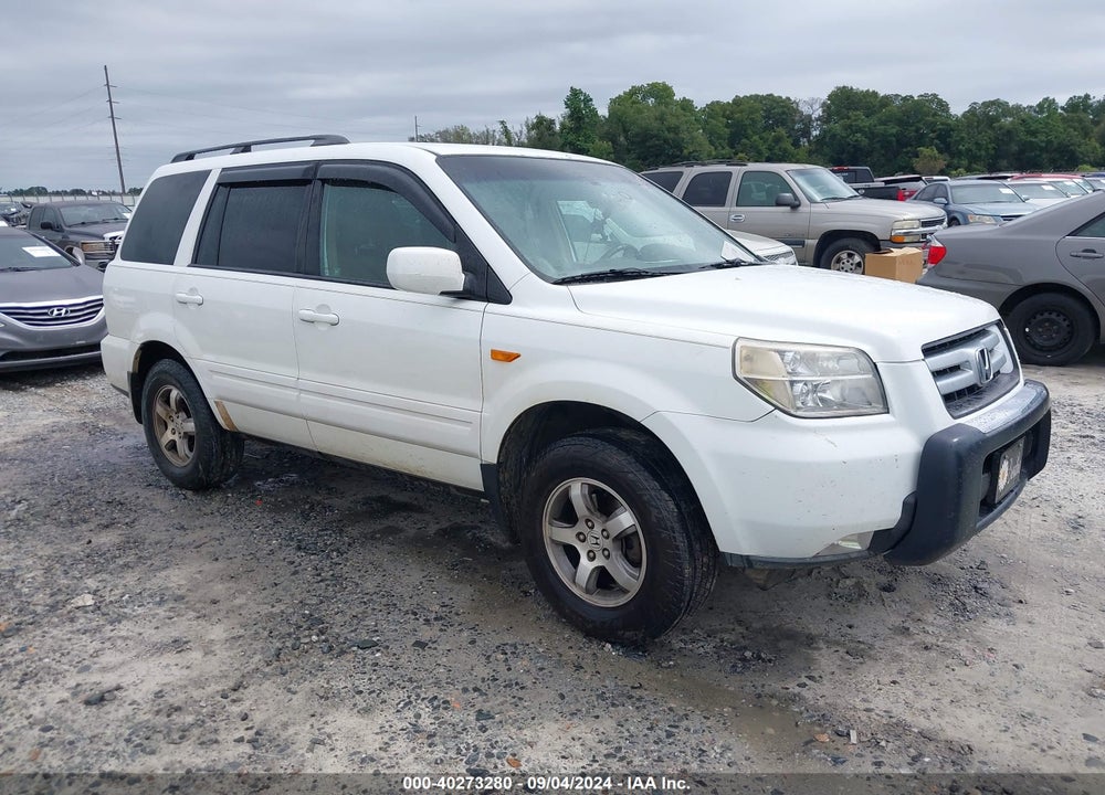 2007 HONDA PILOT EX-L VIN: 5FNYF285X7B040742